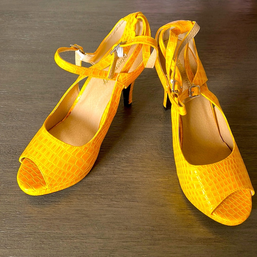 Yellow snake skin high heels